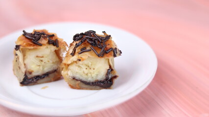 Jakarta's signature baked Bolen cake photographed at various angles of 45 degrees, front view and flat lay. isolate object