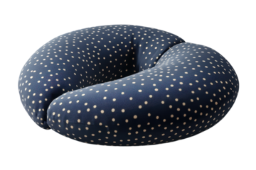 A comforting navy travel pillow with soft white polka dots inviting relaxation on long on transparent background
