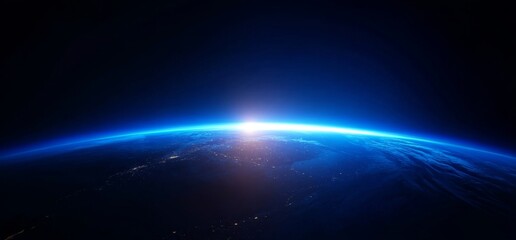 Obraz premium Sunrise over the Earth from space