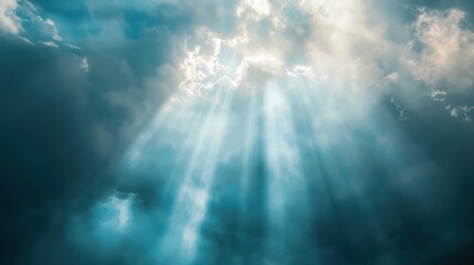 image of light beams breaking through clouds, symbolizing inspiration.