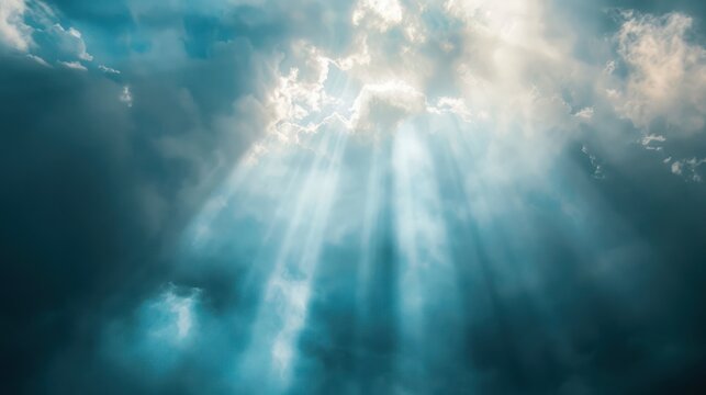 image of light beams breaking through clouds, symbolizing inspiration.