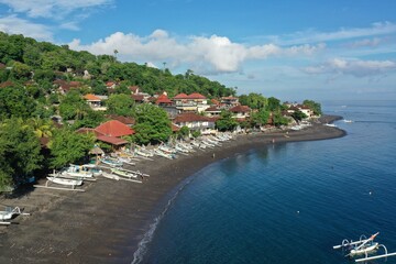 Panoramic View of Amed Coastline with Fishing Boats, Black Sand Beach, and Traditional Balinese Houses