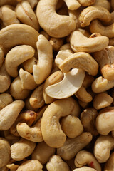A close-up view of many cashew nuts