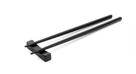 Photo Black Chopsticks on a Dark Wooden Rest