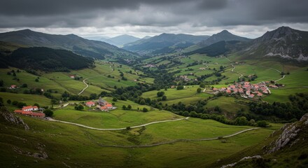 Fototapeta premium Photo of Aerial View Green Valley With Village And Mountains