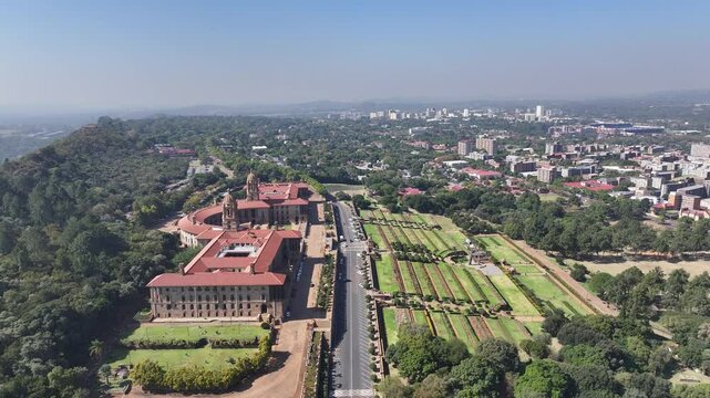 Union Buildings Government Office In Pretoria Gauteng South Africa. Aerial View Of Skyscraper And Busy Traffic In The City Street. Town Clouds Sky Backgrounds Urban. Town Exterior Panorama.