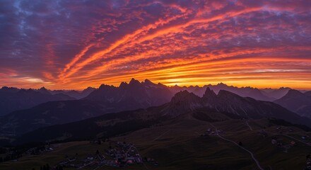 Photo of Dramatic Sunset Over Mountain Range in Dolomites