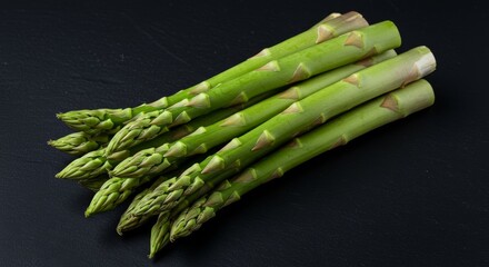 Photo of Fresh Asparagus on Black Table