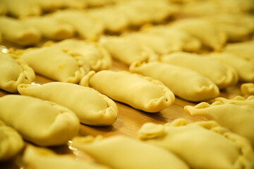 Argentinean Empanadas ready to bake in the oven, traditional food from Argentina.