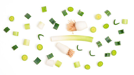Slice spring onions leaves and roots.