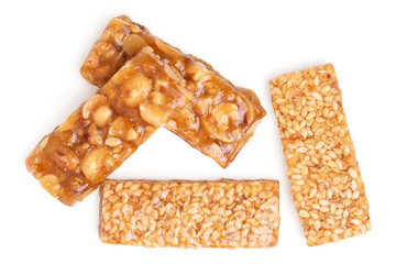 Top view honey bars with peanuts, sesame isolated on white background.