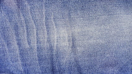 Denim blue fabric texture on background.