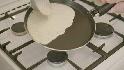 A NonStick Frying Pan is placed on the Gas Stove, perfectly Ready for Cooking delicious meals