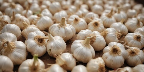 Neatly arranged fresh garlic bulbs, showcasing their aromatic cloves ,  texture,  image