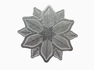 Obraz premium Flat view of flower shaped silver thread embroidery fabric isolated on white