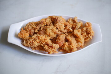 A plate of crispy fried chicken 