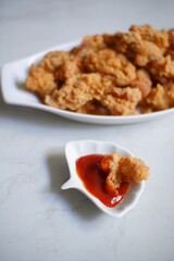 fried chicken breast and sauce 