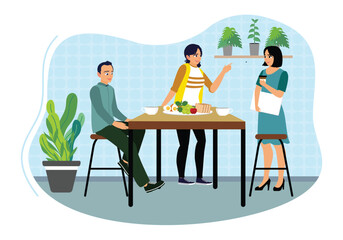 Several coworkers enjoy lunch together in the cafeteria.