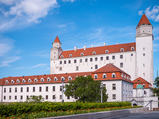 Bratislava Castle, a national symbol of Slovakia, with red roofs and white walls. Important cultural and historical site and top tourist attraction in the Slovak capital.