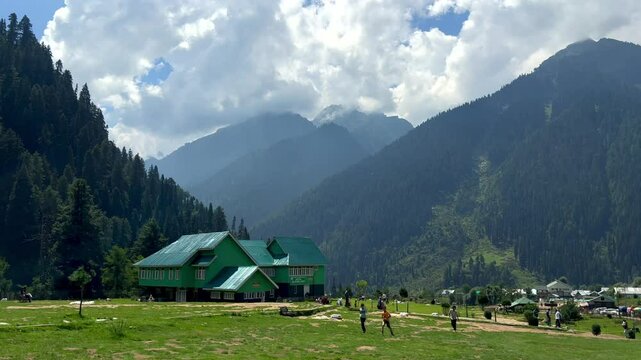 Pahalgam: The Scenic Jewel of Kashmir's Verdant Valleys, Experience the breathtaking beauty of Pahalgam's lush green meadows, surrounded by towering mountains and pristine rivers. Clip 29