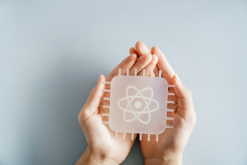 Hands holding quantum chip model, quantum computing, futuristic technology innovation concept