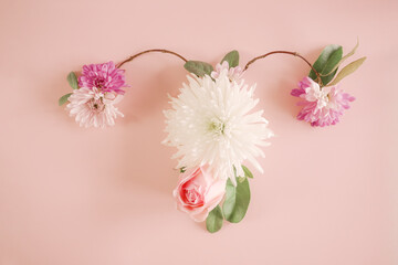 uterus shape made of flowers, female reproductive system , woman health, PCOS, gynecologic and...