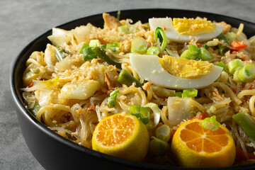 A closeup view of a bowl of pancit canton.