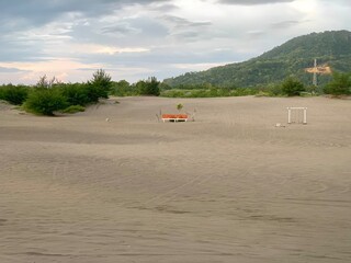 Fototapeta premium Close up the desert and row mountain behind it in Yogyakarta. Beautiful view