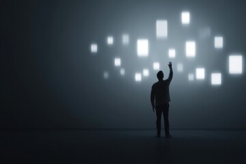 Fototapeta premium Man Reaching Toward Digital Interface in Spotlight with Floating Elements