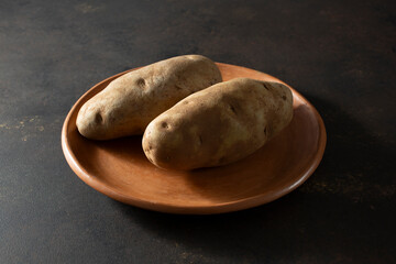 A view of a plate of russet potatoes.