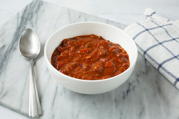 A view of a bowl of chili.