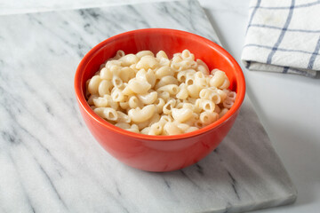A view of a bowl of cooked gluten-free elbow macaroni.