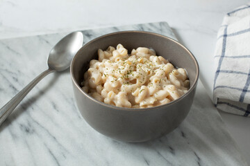 A view of a bowl of gluten-free, dairy-free mac n cheese, Alfredo style.