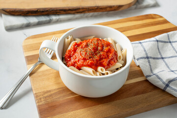 A view of a bowl of gluten-free penne pasta.