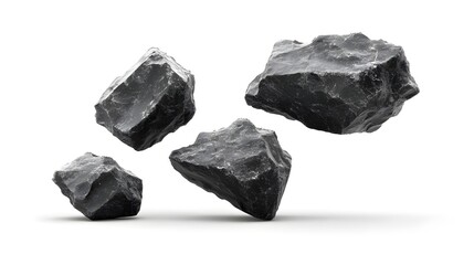 Discovering rugged black obsidian stones suspended in mid air a symbol of raw potential energy with stark white backdrop