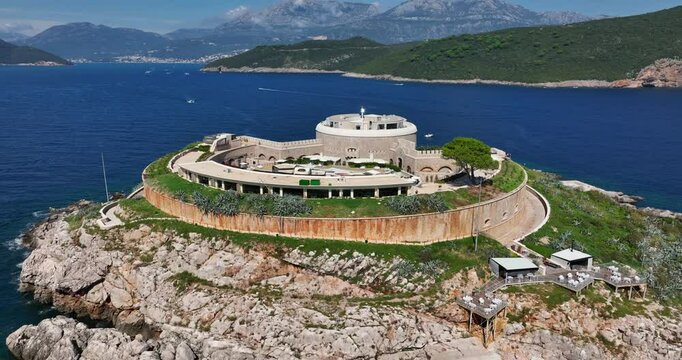 Fort on Mamula Island, sea and coast in Montenegro, aerial pull-out