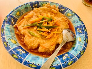 Close up Fuyung hai or egg foo young, this is a Chinese-Indonesian dish consisting of an omelet...