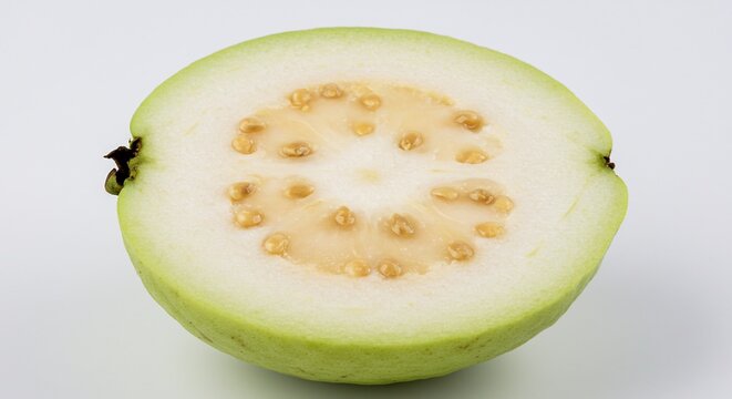 爽やかグアバ半分 白い背景で輝く果肉 種が美しい (Sayaka guaba hanbun shiroi haikei de kagayaku kaniku tane ga utsukushii) Translation: Refreshing guava half, glowing flesh on white background, beautiful seeds.. AI Generated