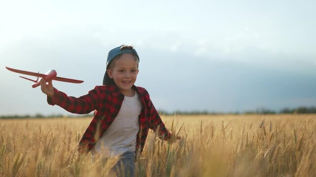 Child running through wheat field. Happy child enjoying nature. Wheat field adventures for young runner. Kid playful run in nature. Joyful child exploring wheat field. Wheat field fun in nature.
