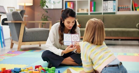 Woman, therapist and child with visual lesson for private tutoring or assessment at therapy office....