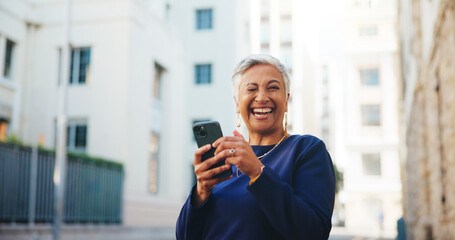 Wink, portrait and phone with business woman in city for communication, real estate listing deal and connection. Networking, client agreement and property viewing schedule with mature person outdoor