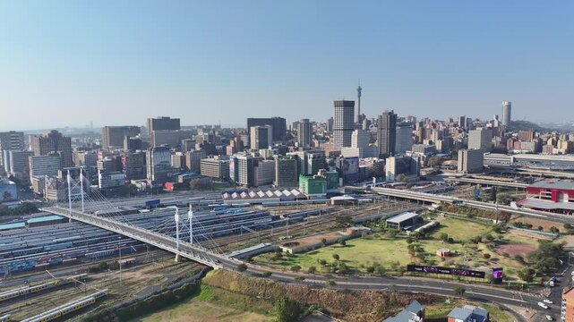 Mandela Bridge In Johannesburg Gauteng South Africa. Aerial View Of Landmark Bridge Showcasing Its Intricate Design . Town Clouds Sky Backgrounds Urban. Backgrounds Downtown Panoramic City.