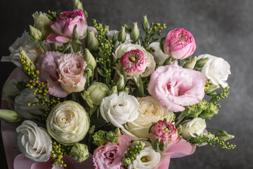 Vibrant floral arrangement showcasing pink and white blossoms in a bouquet