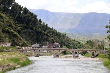 View of the Gorica Bridge- over the Osum River in the city Berat, Albania  