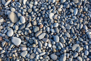 A pile of rocks with a blue tint