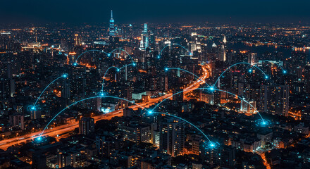 Cityscape at night with network connections over the urban area