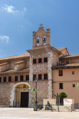 Fototapeta premium Church of San Pedro showing its bell tower and the monument to Bishop Polanco in Teruel, Spain