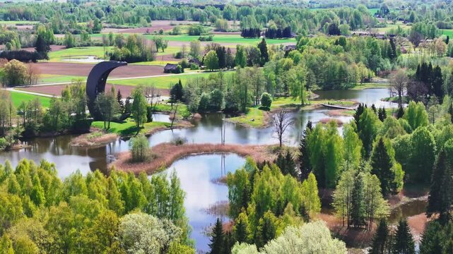 Kirkilai Karst Lakes and Observation Tower Within Birzai Regional Park, Lithuania. Aerial Drone Shot