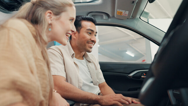 Happy, dealership and couple in new car for purchase on transport with test drive of vehicle. Smile, evaluation and man with woman for decision on automotive shopping with positive choice together.