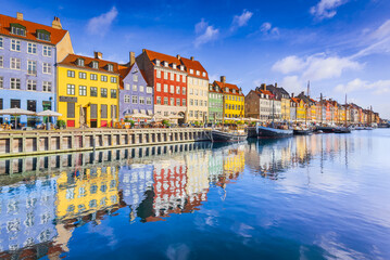 Copenhagen, Denmark. Vibrant harbor of Nyhavn, colorful buildings and boats.